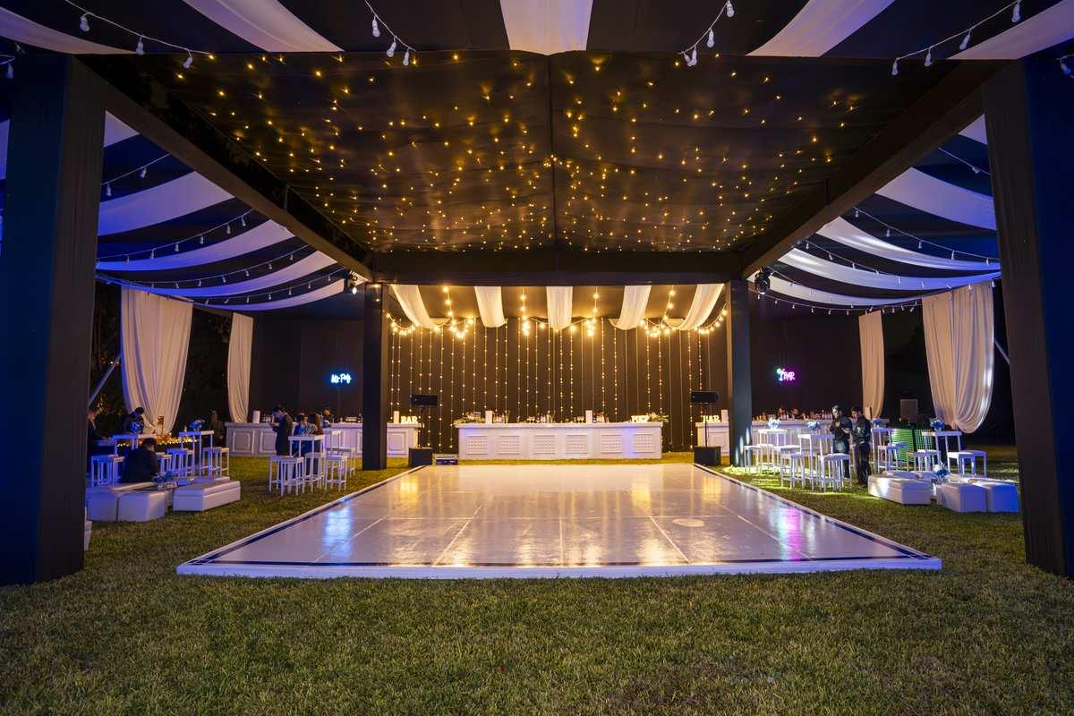 Decoración de mesa larga para cena de gala en Cinco Olivos Lima